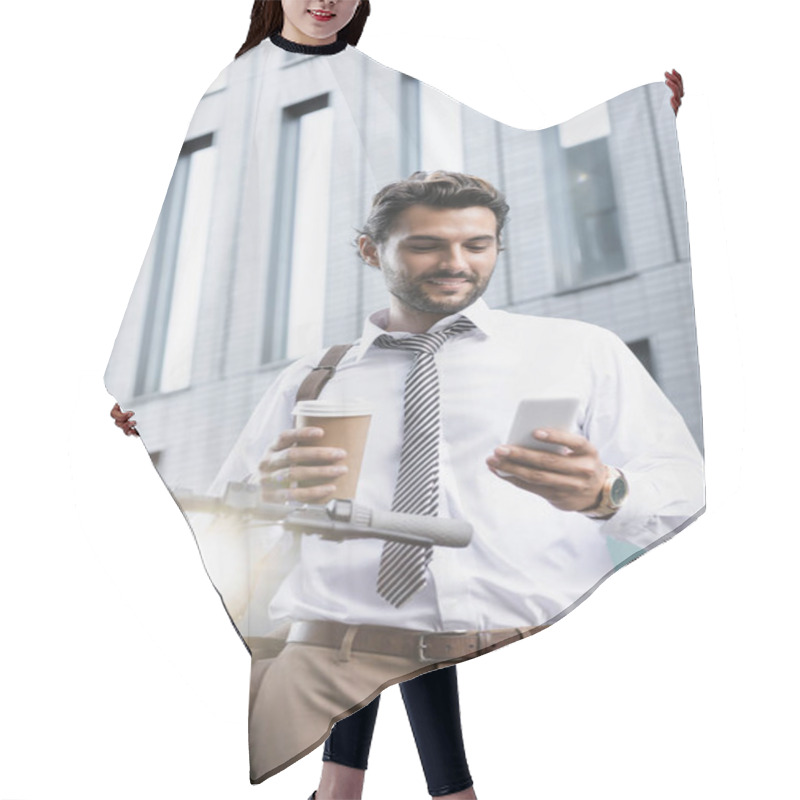 Personality  Smiling Businessman In Formal Wear Holding Paper Cup And Using Smartphone Near E-scooter  Hair Cutting Cape