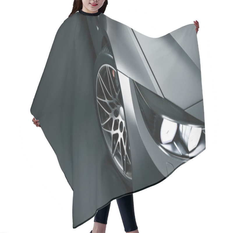 Personality  Black Sports Car. High Angle Black Sports Car. Hair Cutting Cape