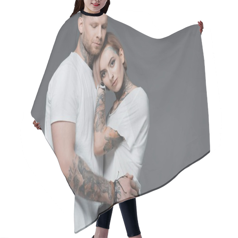 Personality  Stylish Young Tattooed Couple In White T-shirts Hugging Isolated On Grey  Hair Cutting Cape