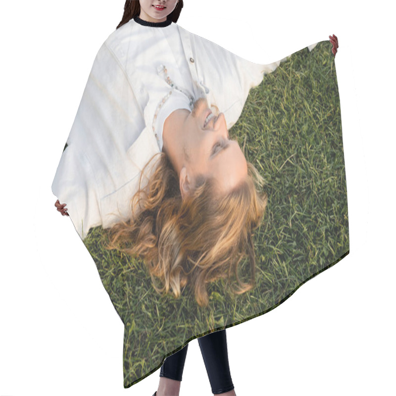 Personality  Top View Of Carefree Long Haired Man In White Shirt Lying And Smiling On Green Lawn Hair Cutting Cape