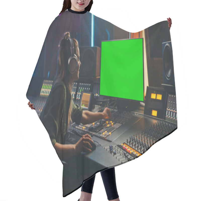 Personality  Stylish Female Audio Engineer Producer Working In Music Record Studio, Uses Headphones, Green Screen Computer Display, Mixer Board, Control Desk To Create New Song. Creative Artist Musician. Hair Cutting Cape