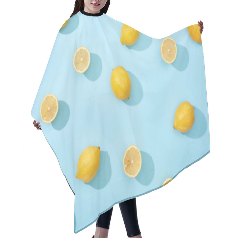 Personality  Top View Of Whole And Cut Yellow Lemons On Blue Background Hair Cutting Cape