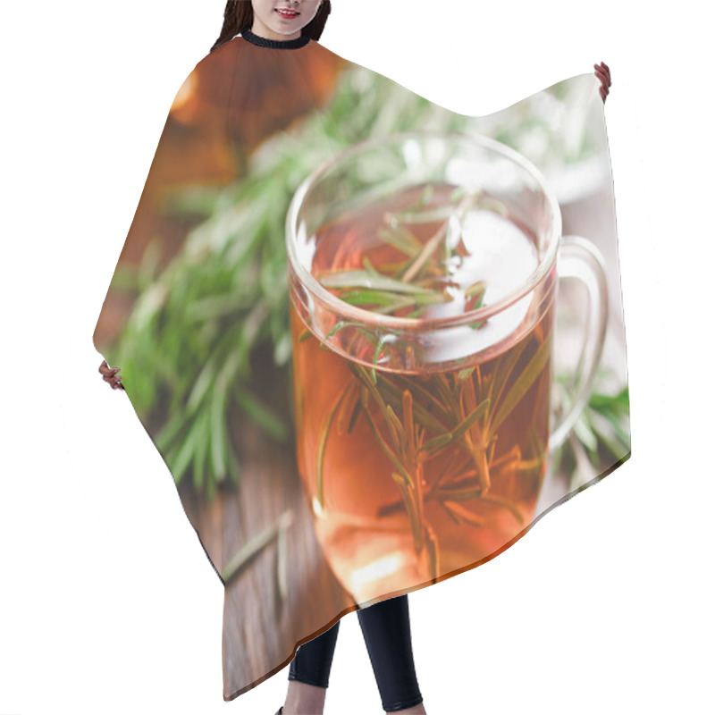 Personality  Rosemary Tea In Glass Tea Cup On Rustic Wooden Table Closeup. Herbal Vitamin Tea.  Hair Cutting Cape