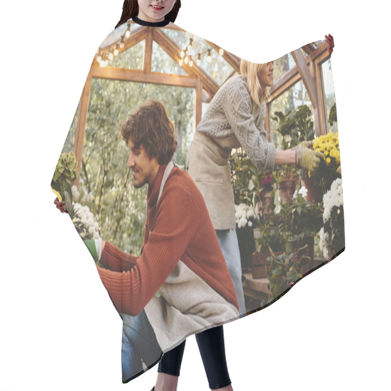 Personality  In A Bright Greenhouse, Young Loving Gay Couple Engage Joyfully In Planting Vibrant Flowers. Hair Cutting Cape