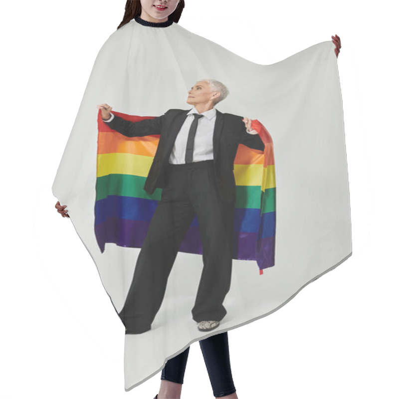 Personality  Confident Woman Showcases Pride Spirit With A Rainbow Flag And Sharp Attire. Hair Cutting Cape