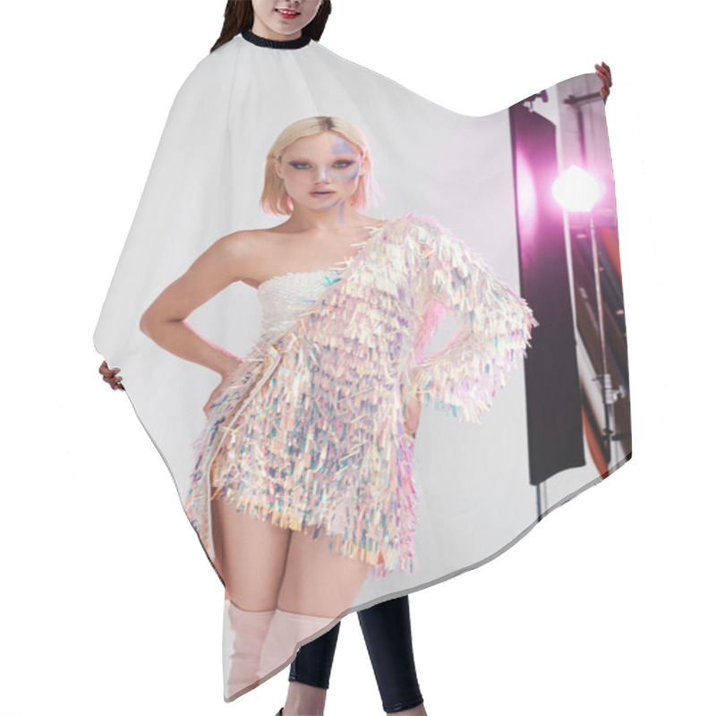 Personality  A Stylish Young Woman Poses Confidently In Shimmering Attire With Holographic Details. Hair Cutting Cape