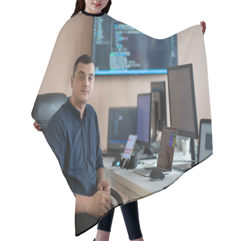 Personality  A Programmer Diligently Testing Smartphone Applications While Sitting In Their Office. High Quality Photo Hair Cutting Cape