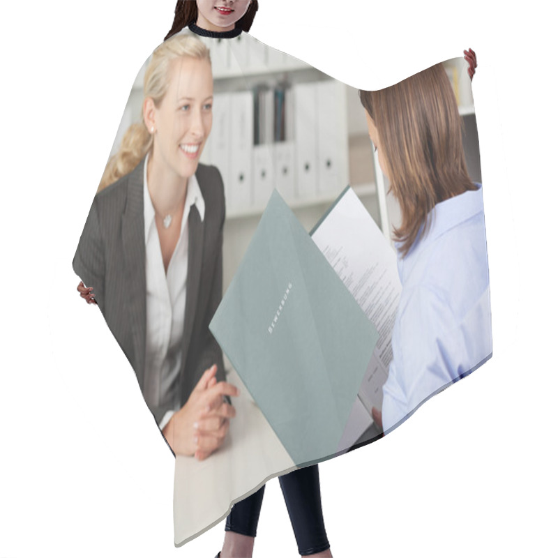 Personality  Businesswoman Reading Female Candidate's CV At Desk Hair Cutting Cape