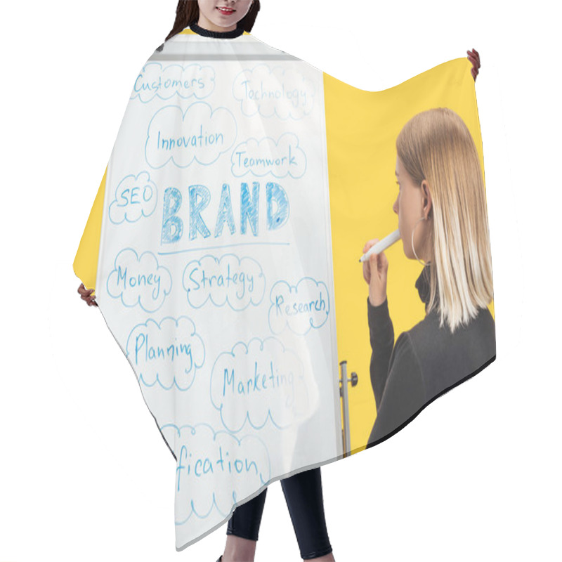 Personality  Side View Of Pensive Businesswoman Standing Near White Flipchart With Words Hair Cutting Cape