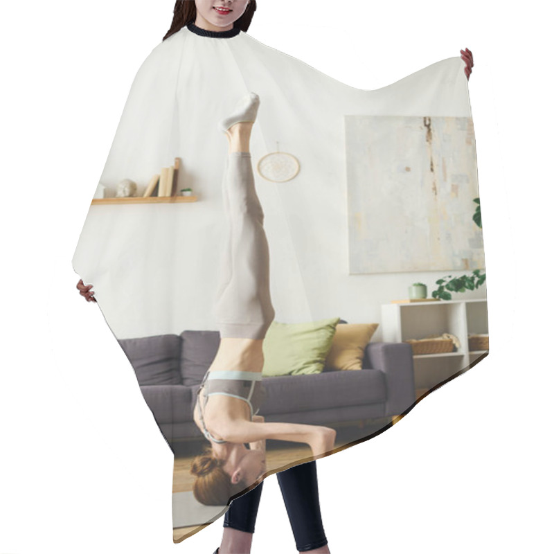 Personality  A Determined Young Woman With Anorexia Showcases Her Strength And Focus While Practicing Handstands In Her Cozy Living Space. Hair Cutting Cape