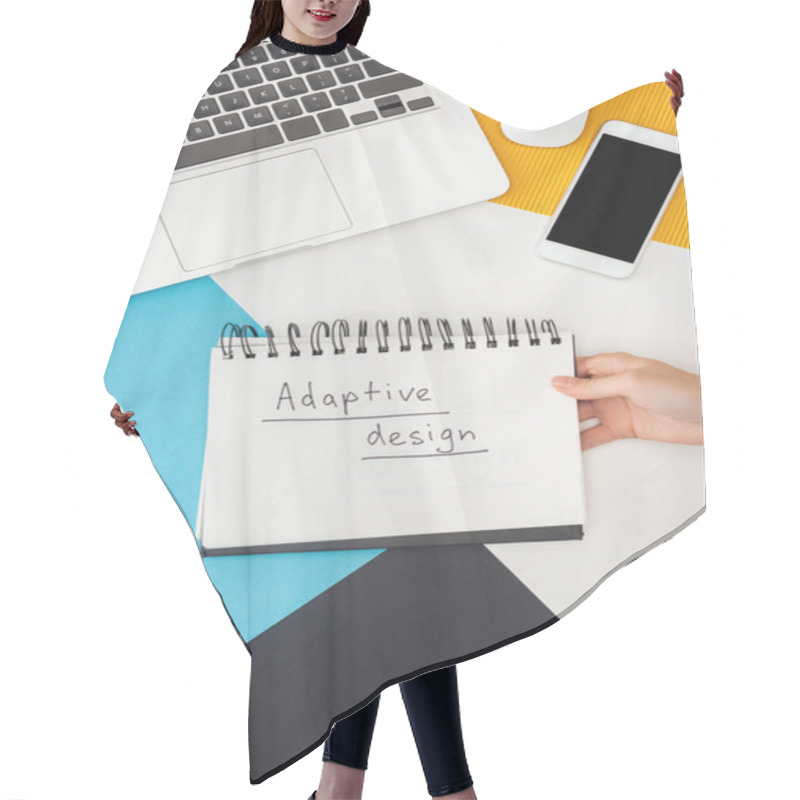 Personality  Cropped View Of Woman Holding Notebook With Adaptive Design Lettering Near Laptop, Smartphone, Computer Mouse On Abstract Geometric Background Hair Cutting Cape