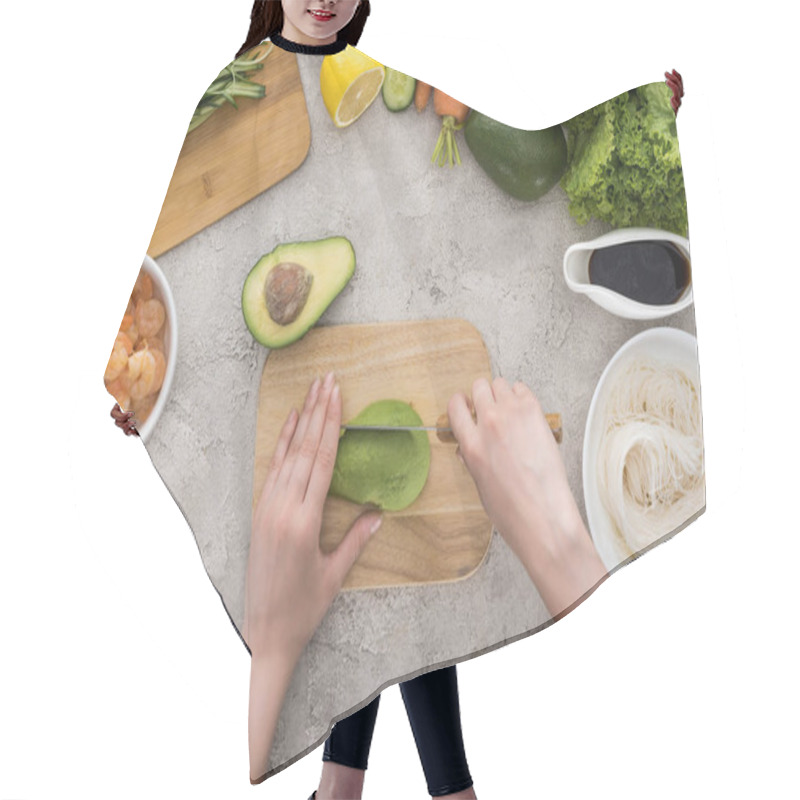 Personality  Top View Of Woman Cutting Avocado With Knife On Cutting Board  Hair Cutting Cape