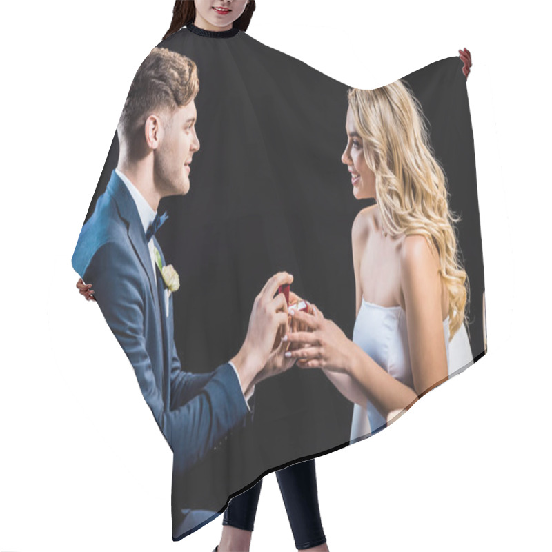 Personality  Handsome Young Man Making Marriage Proposal To Happy Young Woman Isolated On Black Hair Cutting Cape