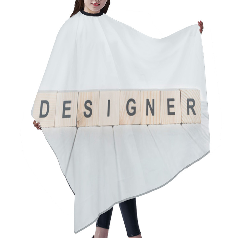 Personality  Close Up View Of Designer Word Made Of Wooden Cubes On White Wooden Tabletop  Hair Cutting Cape