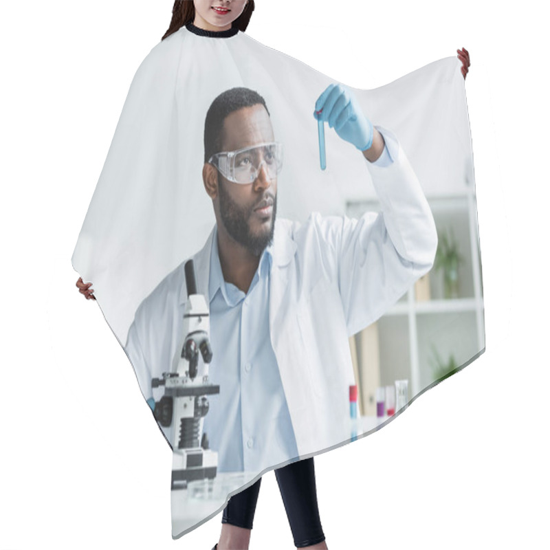 Personality  African American Scientist In Latex Gloves And Safety Goggles Holding Test Tube Near Microscope  Hair Cutting Cape