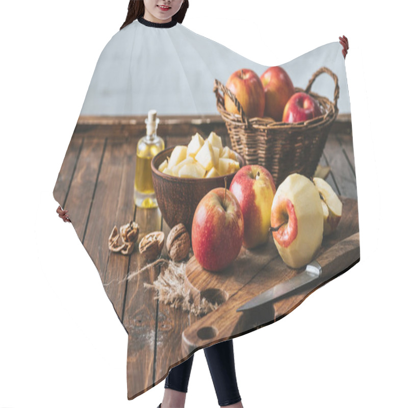 Personality  Close Up View Of Bottle Of Juice, Fresh Apples On Cutting Board, Hazelnuts And Knife On Wooden Surface Hair Cutting Cape