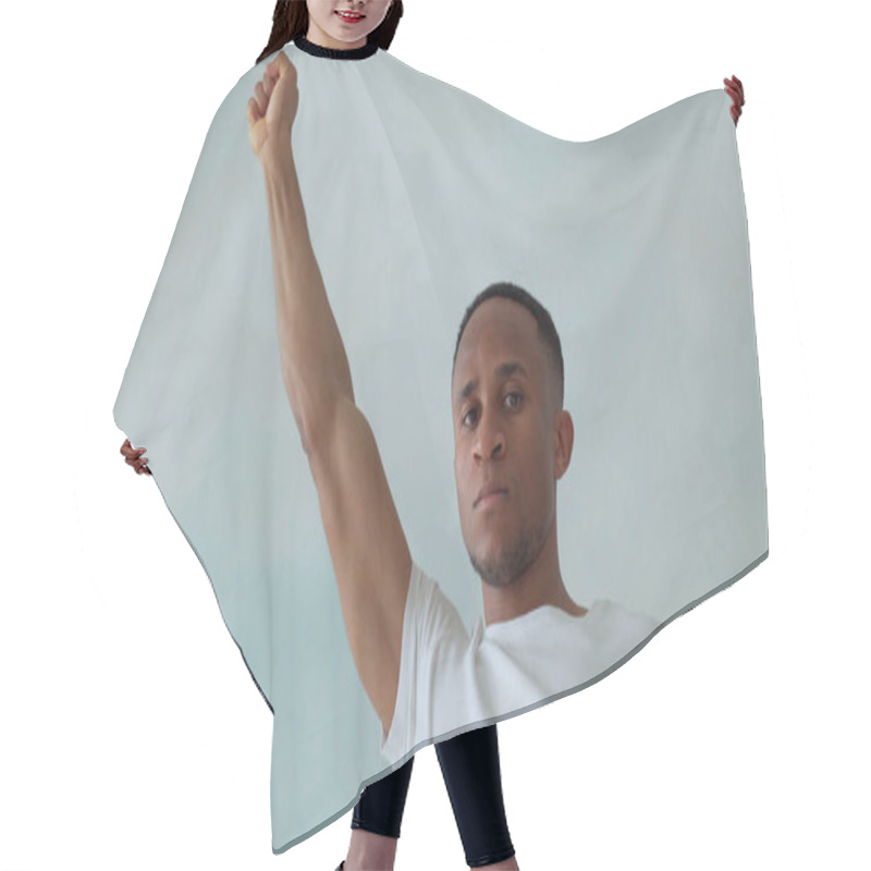 Personality  Close Portrait Of A Black Man With His Fist Raised Up. Black Lives Matter Hair Cutting Cape