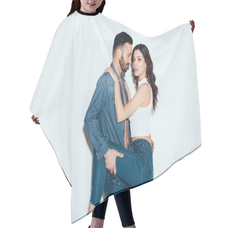 Personality  Sensual Loving Couple In Jeans Embracing On Grey Hair Cutting Cape