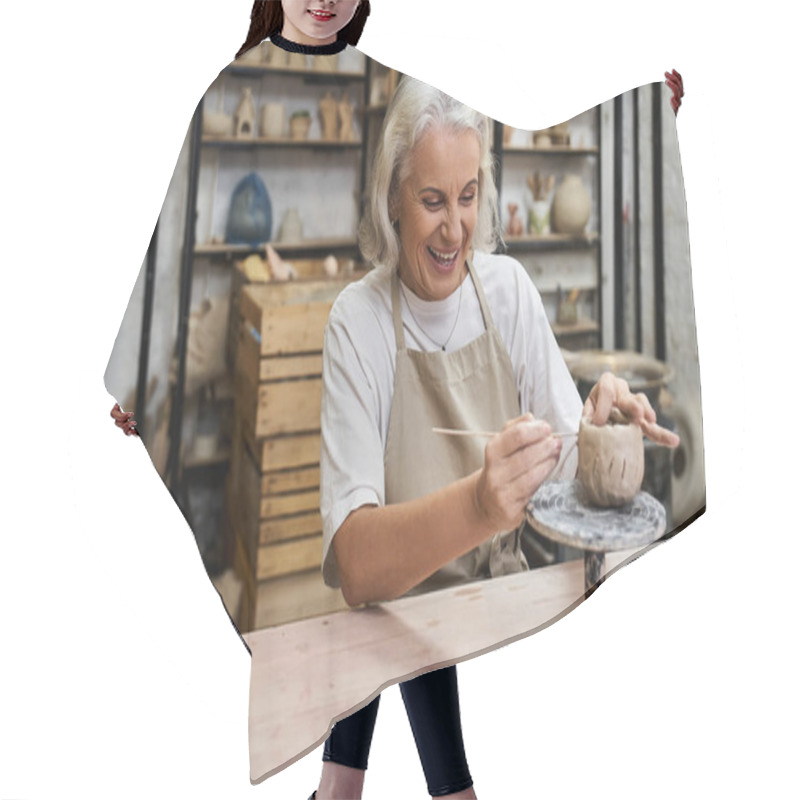 Personality  A Happy Woman Creates Pottery, Focusing Intently On Her Artwork In A Lively Workshop. Hair Cutting Cape