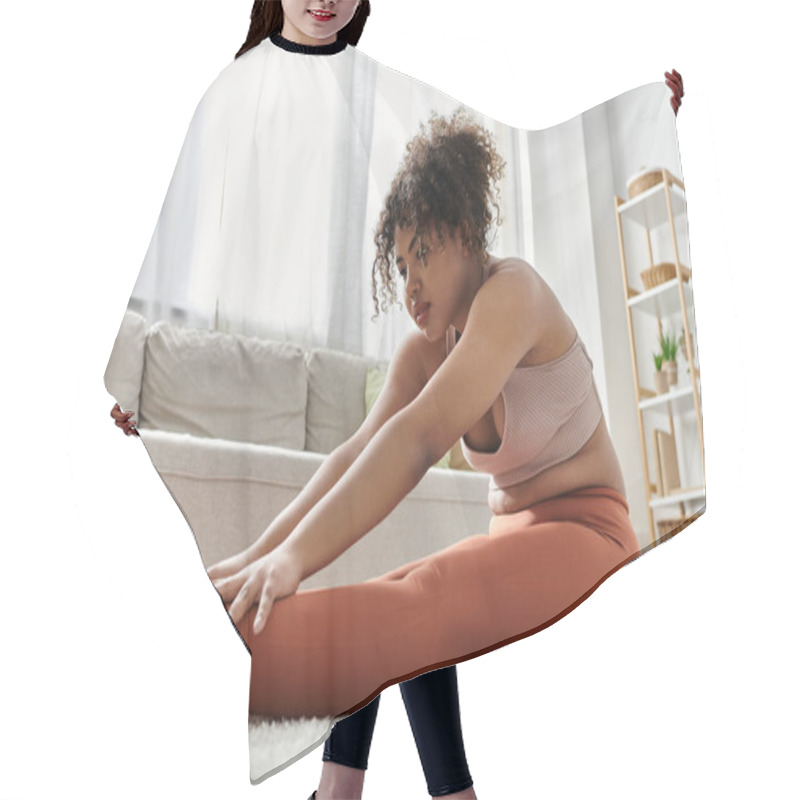 Personality  A Young Woman Enjoys Stretching In Her Cozy Living Space. Hair Cutting Cape