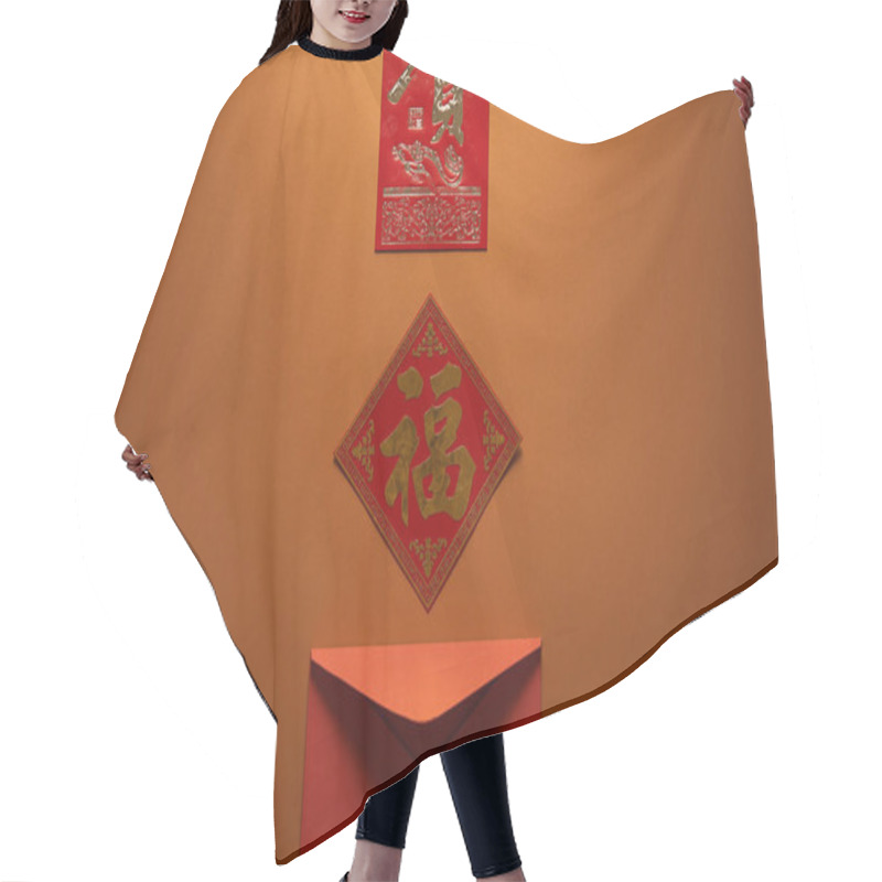 Personality  Red Envelope And Hieroglyphs On Brown Background, Chinese New Year Concept  Hair Cutting Cape