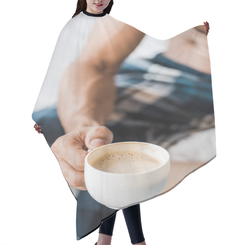 Personality  Cropped View Of Bi-racial Man Holding Cup Of Coffee In Morning  Hair Cutting Cape