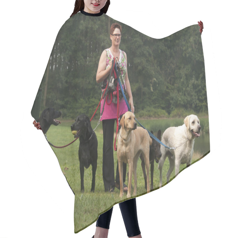 Personality  Woman Walks With Four Dogs On Green Grass Hair Cutting Cape