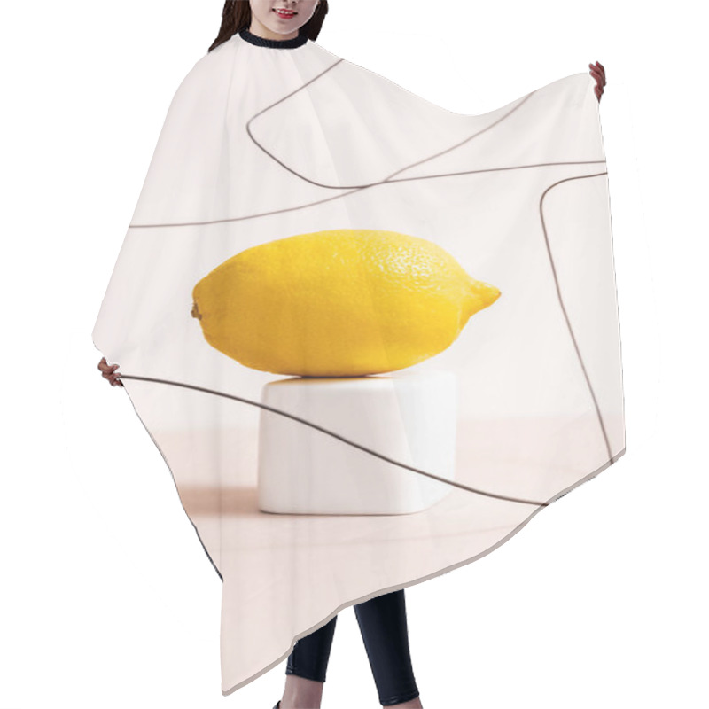 Personality  Lemon On Cube And Wire Isolated On Beige Hair Cutting Cape