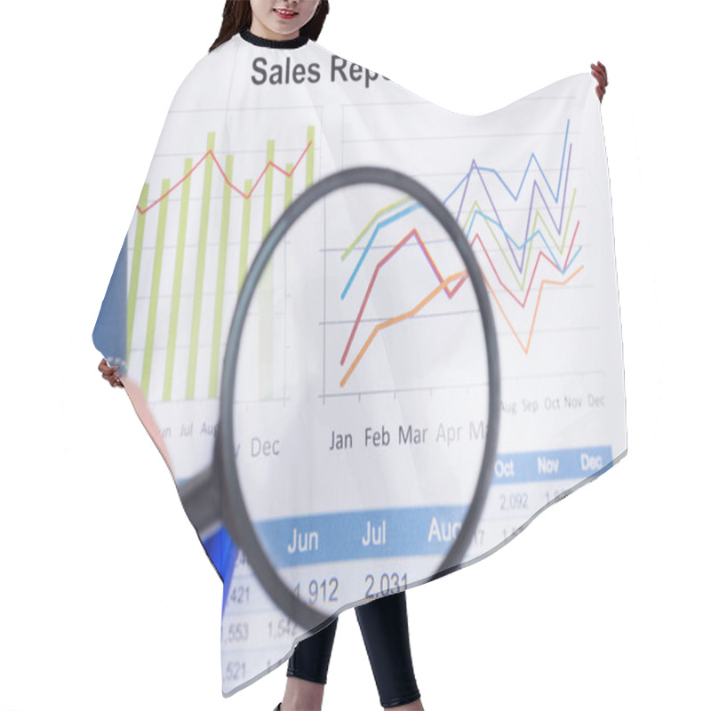 Personality  Sheet Of Annual Sales Report With Blue Pen Hair Cutting Cape