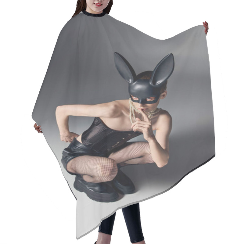 Personality  Provocative Queer Person In Corset Posing In Bdsm Bunny Mask On Grey, Sitting, Edgy Fashion Hair Cutting Cape