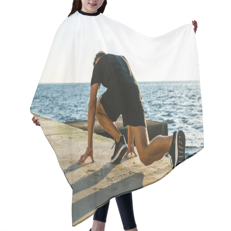 Personality  Athletic Sprint Runner In Start Position For Run On Seashore Hair Cutting Cape