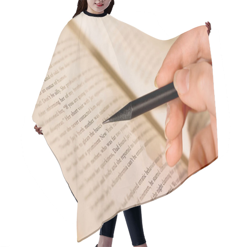 Personality  Cropped View Of Woman Holding Pencil Near Book  Hair Cutting Cape