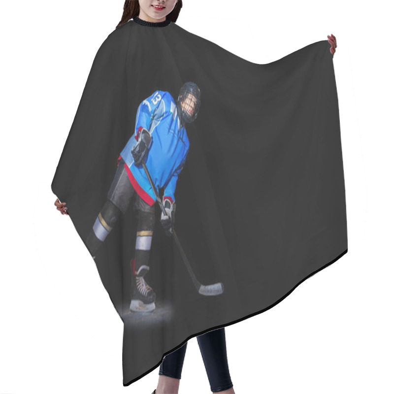 Personality  Full-length Portrait Of Teenage Boy, Ice Hockey Player With Stick In Spot Light Over Black Background Hair Cutting Cape