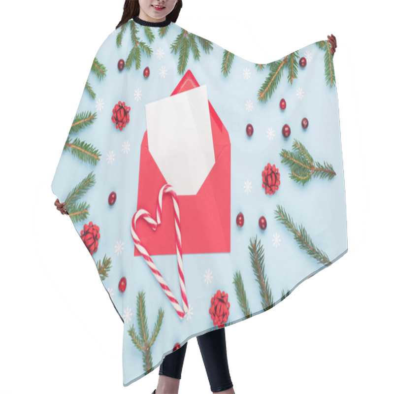 Personality  Christmas Winter Holiday New Year Composition. Fir Tree Branches, Red Cranberries, Xmas Red Empty Envelope And Candy Canes On Pastel Blue Background. Flat Lay, Top View, Copy Space. Hair Cutting Cape