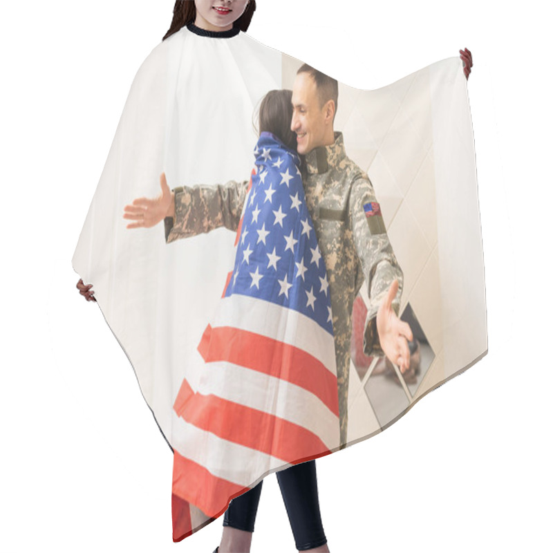 Personality  Portrait Of Happy American Family Father In Military Uniform And Cute Little Girl Daughter With Flag Of United States Hugging And Smiling At Camera Hair Cutting Cape