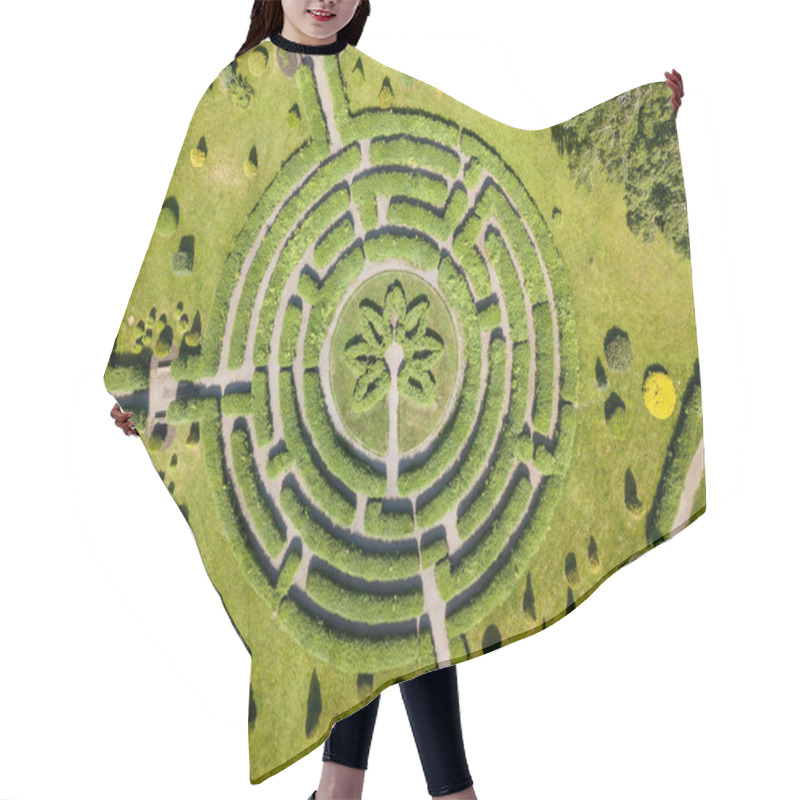 Personality  Plant Maze. Aerial Drone View. Hair Cutting Cape