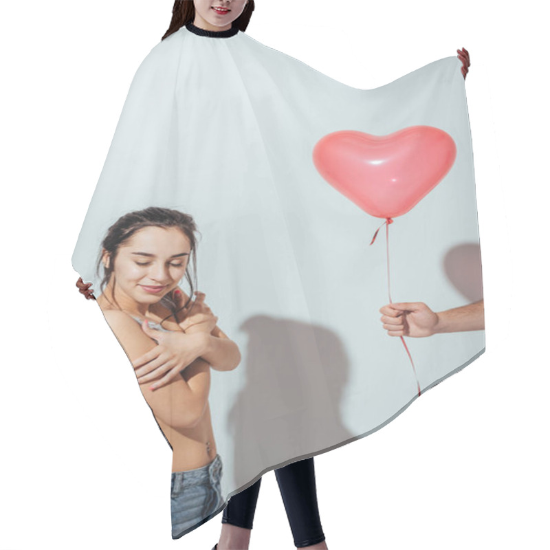 Personality  Cropped View Of Man Giving Red Balloon In Heart Form To Attractive Girl Who Standing With Closed Eyes  Hair Cutting Cape