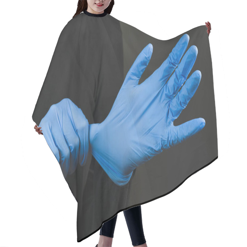 Personality  Putting On Blue Rubber Hand Gloves. Wearing Protective Hand Gear Against The Infection Or Virus Spread. Covid-19, Laboratory Or Scientific Laboratory Concept Hair Cutting Cape