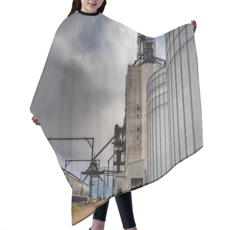 Personality  Swift Current, SK/Canada- 10 May, 2019:  Semi Unloading Under Stormy Skies At Paterson Grain Terminal In Swift Current, SK, Canada With Railway Hair Cutting Cape