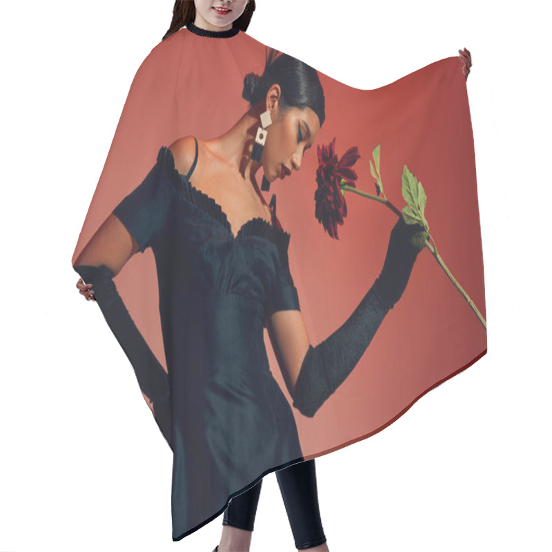 Personality  Trendy Spring, Expressive And Youthful Asian Woman With Brunette Hair And Trendy Earrings, Wearing Long Gloves And Black Dress, Posing With Hand On Hip And Burgundy Peony On Red And Pink Background Hair Cutting Cape