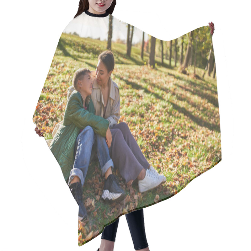 Personality  Motherly Love, Cheerful African American Woman And Son Sitting On Grass With Golden Leaves, Autumn Hair Cutting Cape