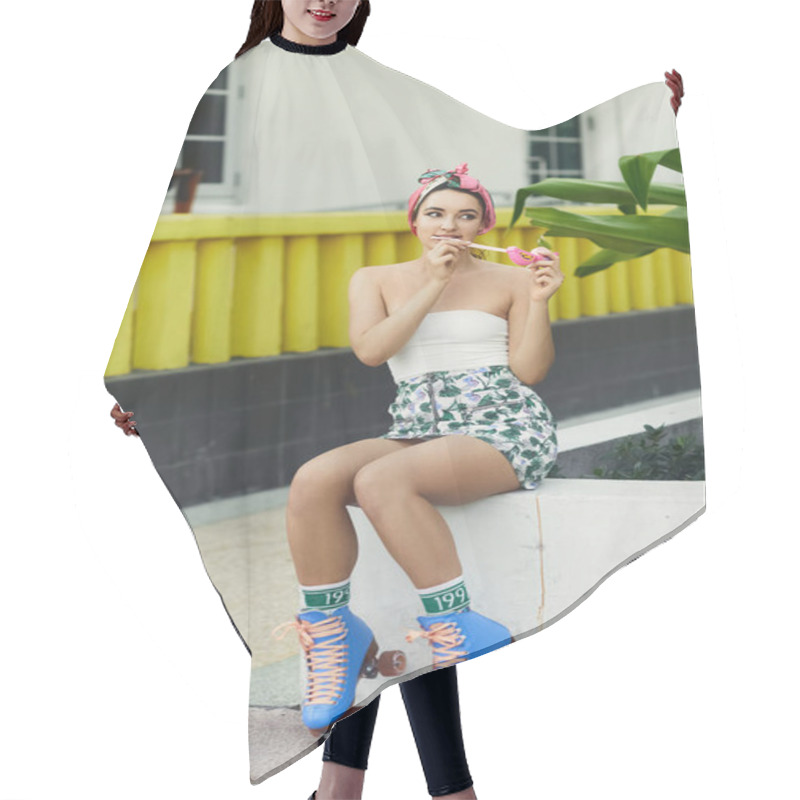 Personality  A Young Woman In Sunglasses And Stylish Attire Sits On A Curb In Miami, While Wearing Roller Skates. Hair Cutting Cape