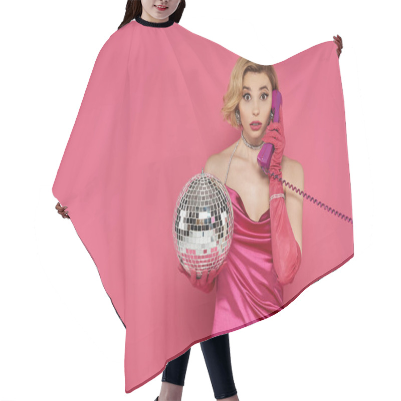 Personality  A Woman In A Pink Dress And Long Gloves Holds A Disco Ball While Talking On A Vintage Phone. Hair Cutting Cape