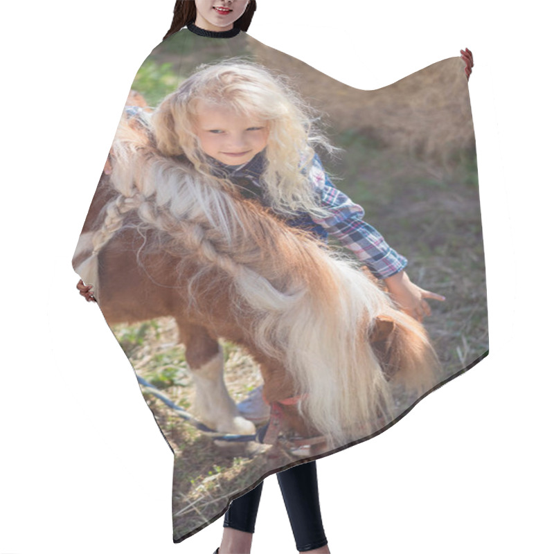 Personality  Preteen Child Hugging Cute Pony At Farm Hair Cutting Cape