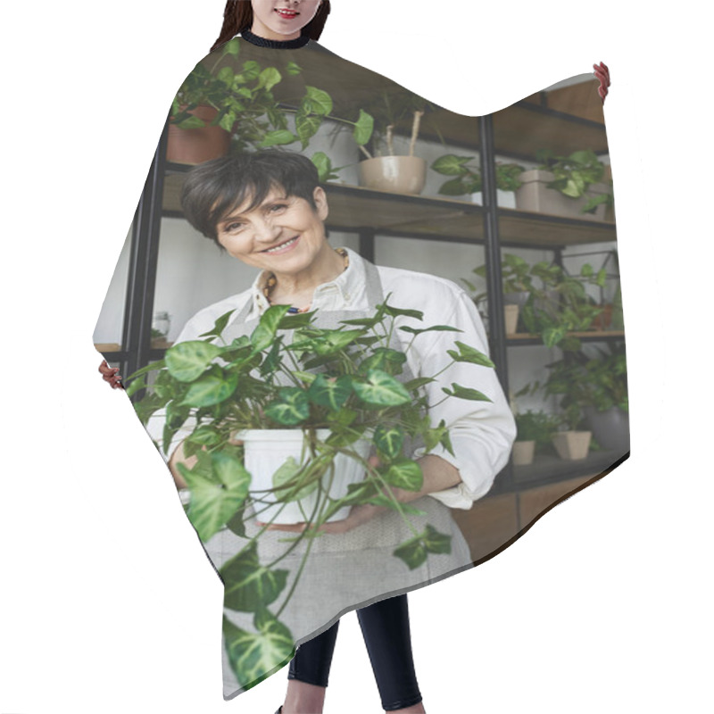 Personality  A Gardener Cares For Her Plants, Enjoying The Peaceful Atmosphere Of Her Studio. Hair Cutting Cape