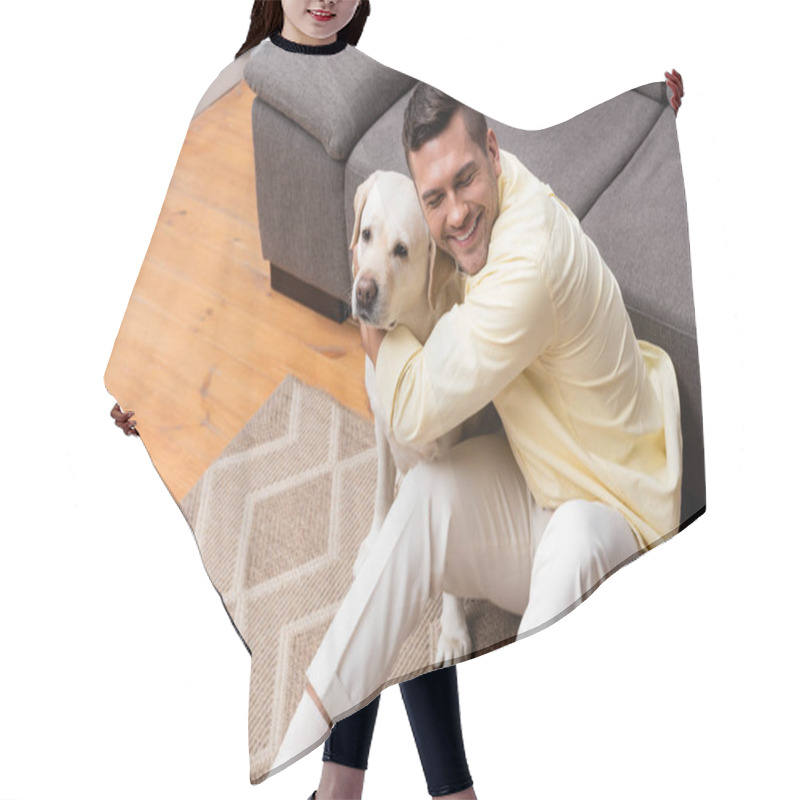 Personality  High Angle View Of Man With Closed Eyes Sitting On Floor And Hugging Labrador Dog Hair Cutting Cape