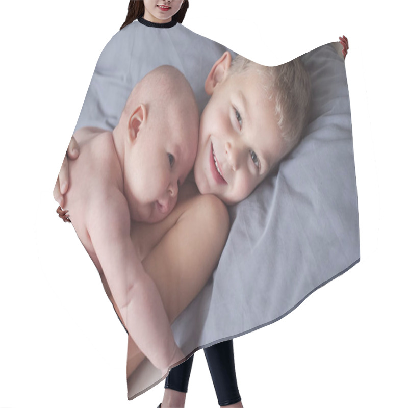 Personality  Cute Little Brothers In White Bodysuits  Lying On Bed Together At Home Hair Cutting Cape