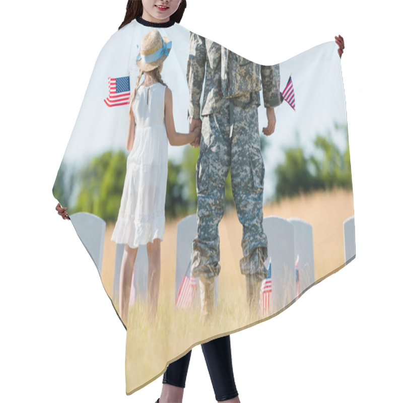 Personality  Cropped View Of Military Man And Patriotic Child Holding Hands And American Flags  Hair Cutting Cape