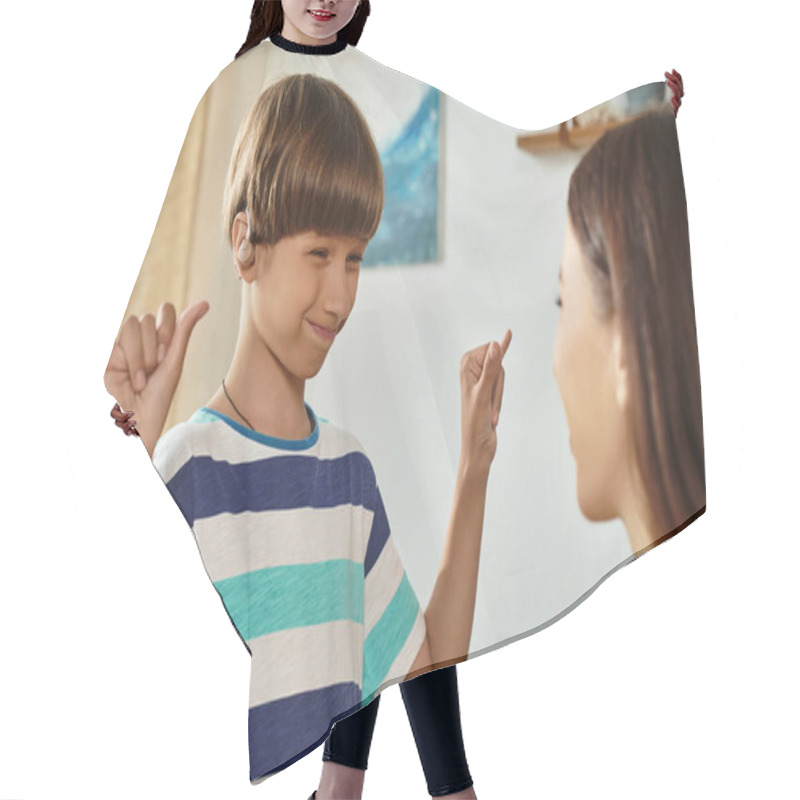 Personality  A Mother And Her Son Share A Moment Of Joyful Communication Using Sign Language At Home. Hair Cutting Cape