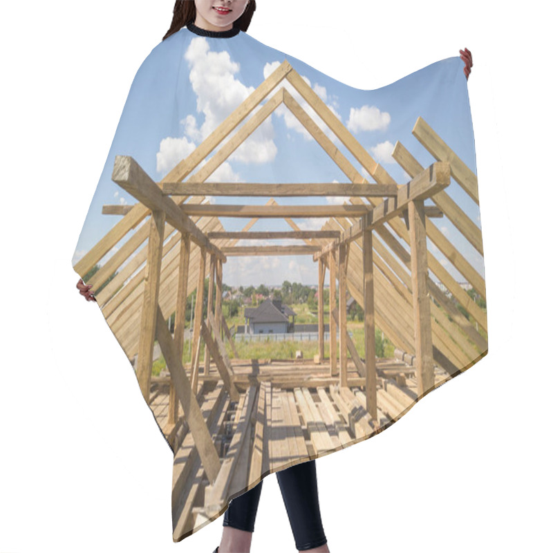 Personality  Aerial View Of Unfinished House With Wooden Roof Frame Structure Under Construction. Hair Cutting Cape